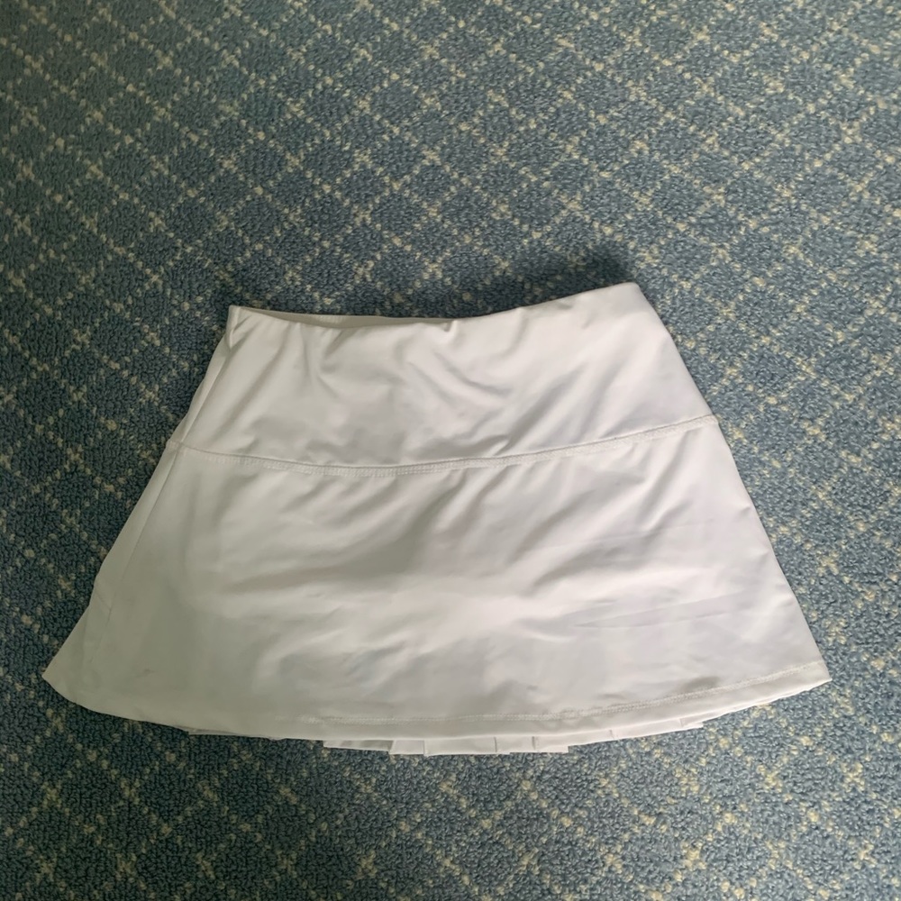 White pleated skirt